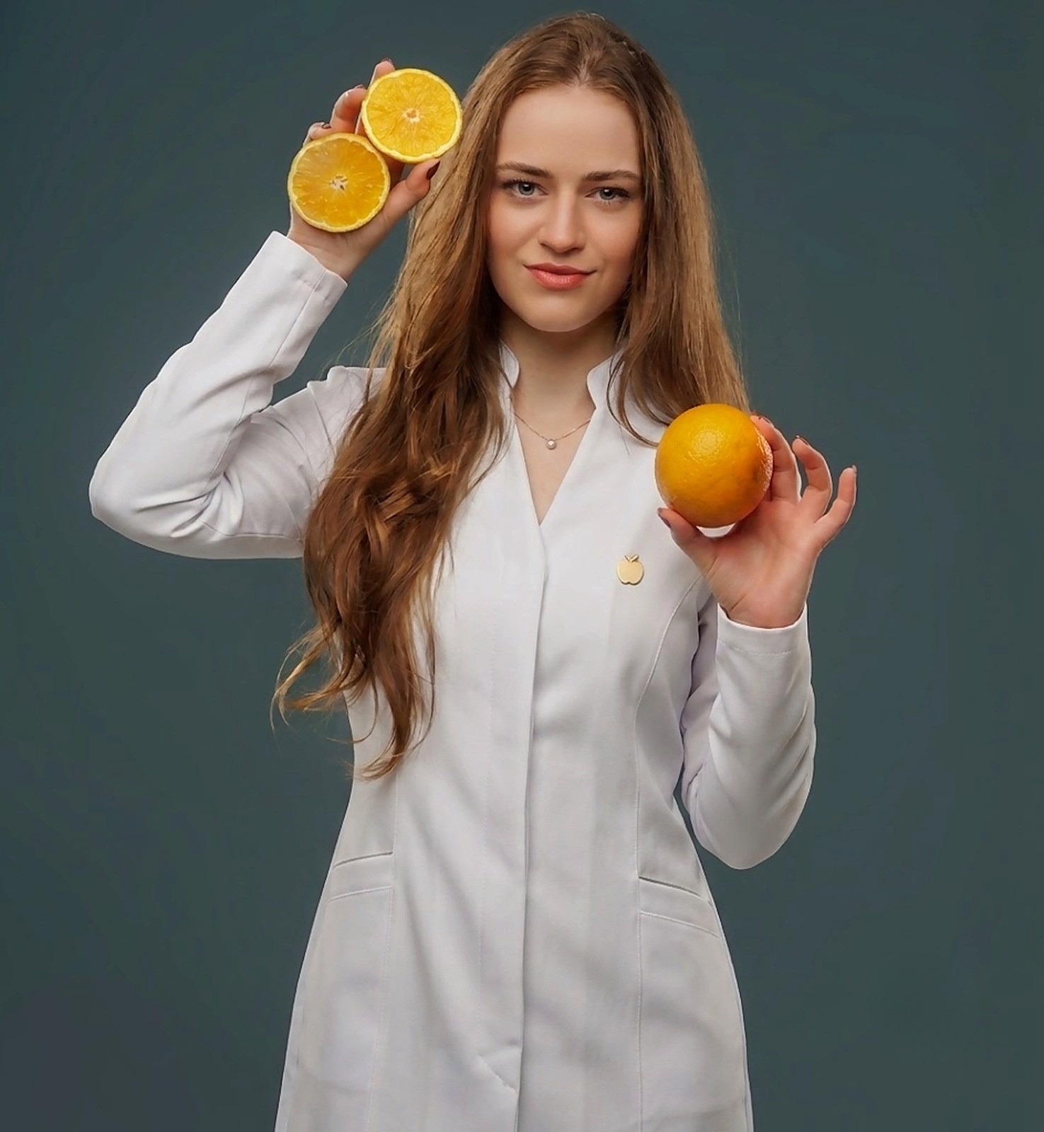 Eliziane Mol, nutricionista de jaleco branco